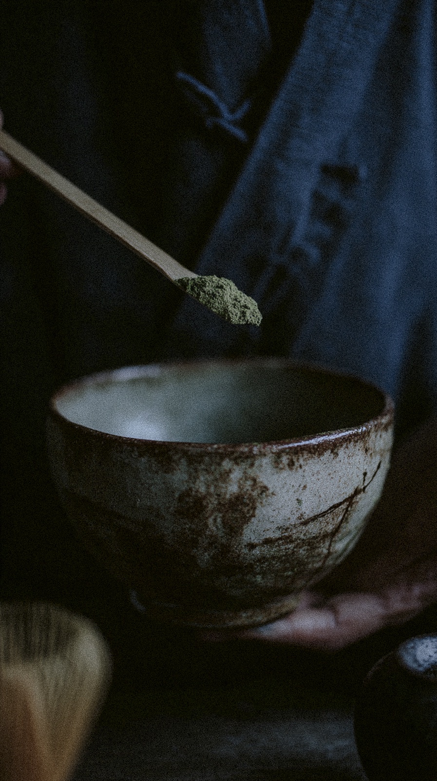 Matcha powder measured over a tea bowl